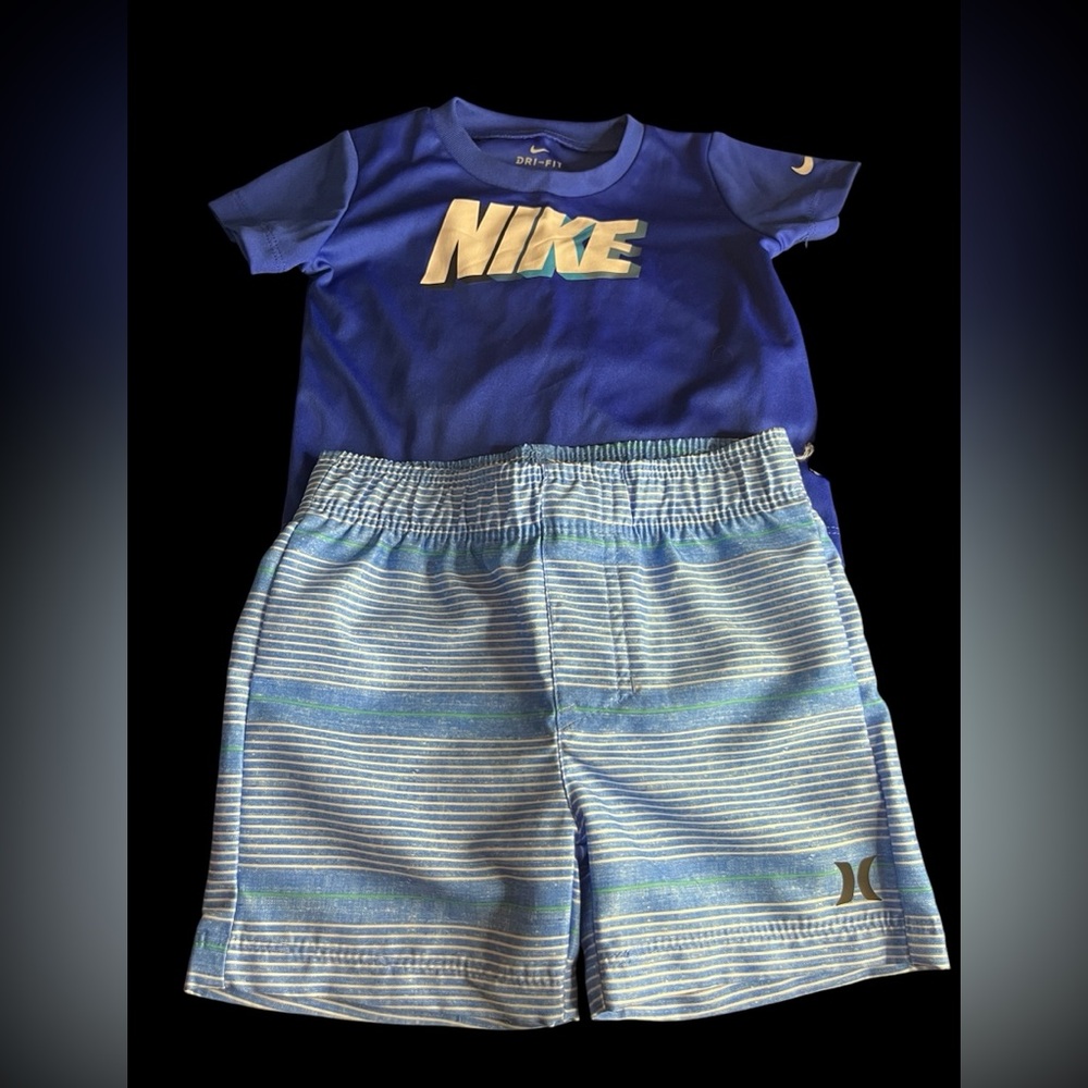 NWOT 3 pc Nike shirt & 2pr of shorts